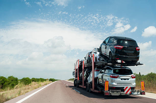 a truck with a trailer on the back of it