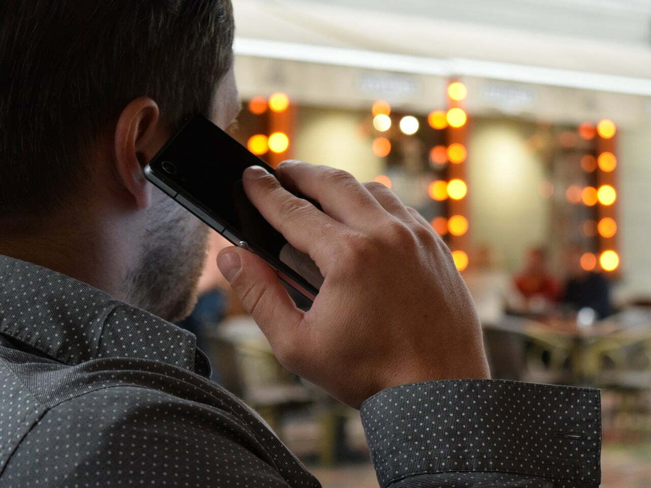 a man holding a phone