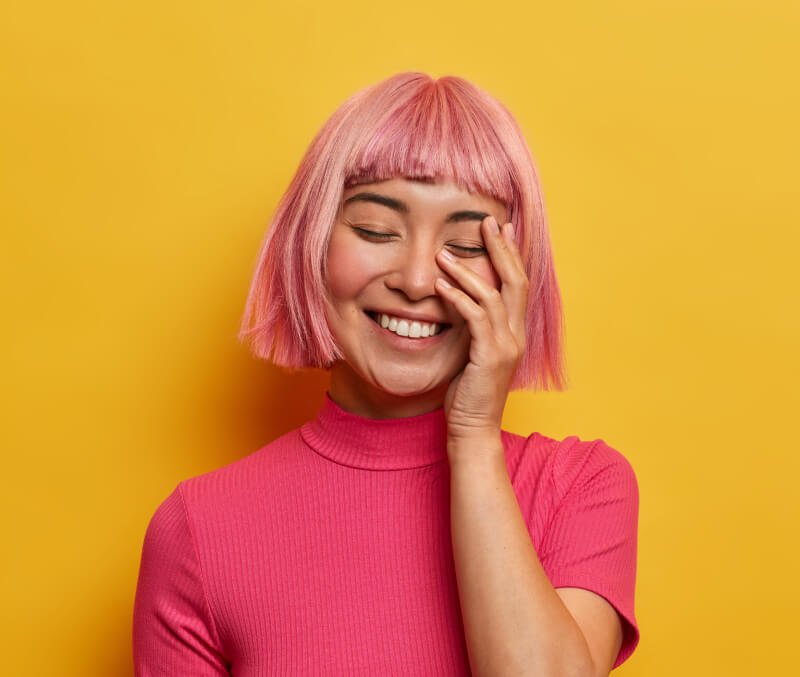 a woman with pink hair