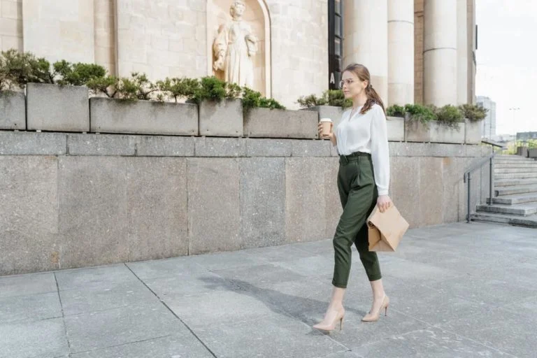 a person walking on a sidewalk