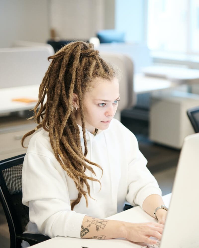 a woman sitting at a desk