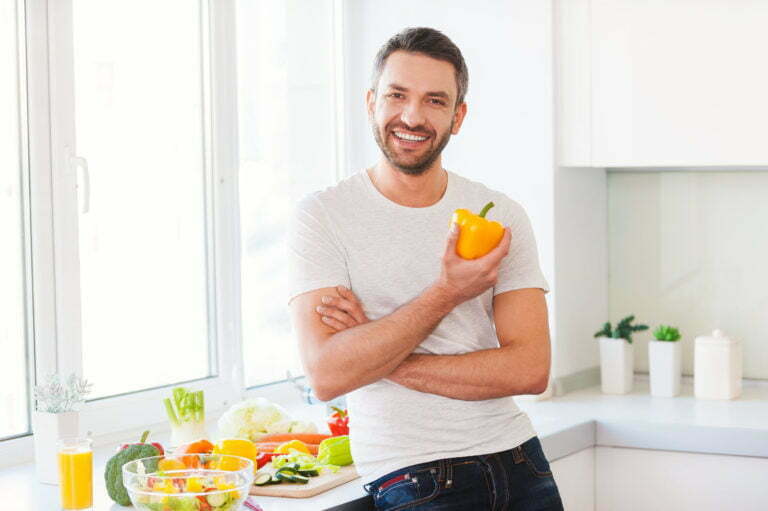 a person holding an orange