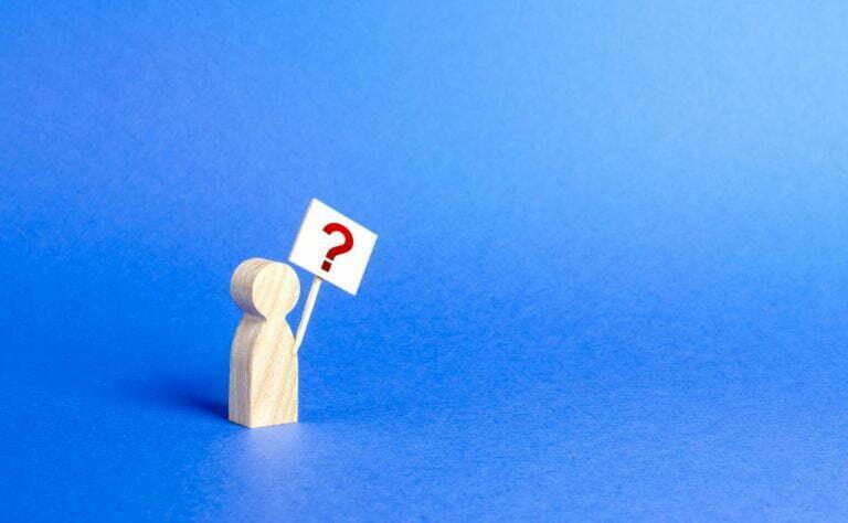 a white cross with a face on it